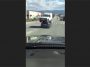 Car transporting another car on its roof (Video)