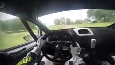 Pro rally driver speeding through the narrow road - Pegagu