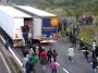 Migrants in Calais climbing into moving lorries - Pegagu