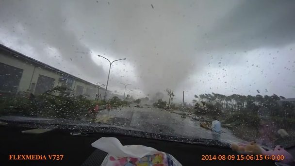 A car gets sucked in by the tornado