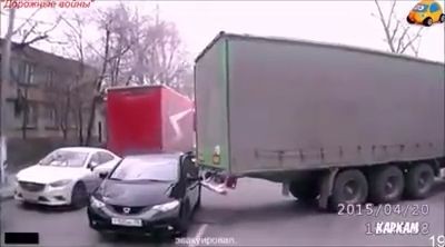 Lorry accidentally hooks the car and drags it