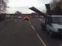 Unstrapped steel bars on a van hits the oncoming vehicle (Video)