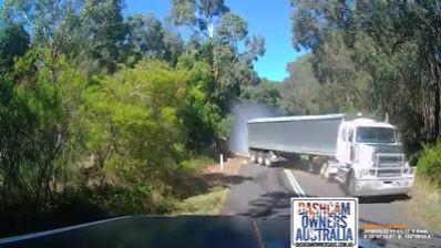 Fast moving truck runs through the obstruction (Video)
