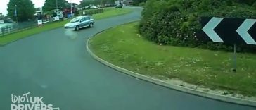Car driver driving on a wrong roundabout side (Video)