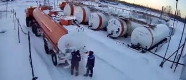 Idiots use live fire to find a leak on a petrol tanker (Video)